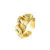 Élodie Ring unique, textured gold ring featuring a nature inspired molten metal design for a chic, organic look.