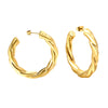 Elena Hoops chic gold twisted hoop earrings with a unique sculpted design, a must have statement piece for jewelry lovers.