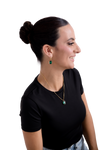 Elegant Woman Wearing Green Gemstone Jewelry Set | Gold Necklace and Earrings Fashion